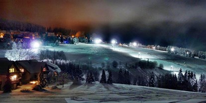 Skiregion - Après Ski im Skigebiet: Schirmbar - Winterberg - Flutlicht-Skifahren und -Rodeln dreimal die Woche auf bis zu 8 Pisten - Postwiesen Skidorf Neuastenberg