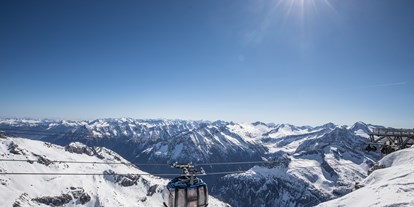 Skiregion - Après Ski im Skigebiet: Schirmbar - PLZ 6293 (Österreich) - Der Gletscherbus 3, die höchstgelegene Zweiseilumlaufbahn auf der ganzen Welt - Skigebiet Hintertuxer Gletscher