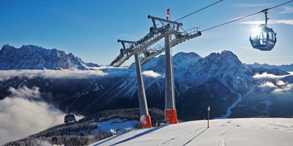 Skiregion - Après Ski im Skigebiet: Schirmbar - Kabinenbahn Grubig II - Skigebiet Grubigstein/Lermoos - Zugspitz Arena