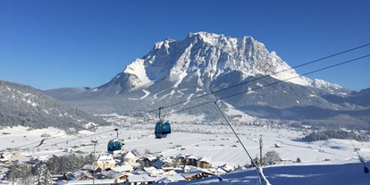 Skiregion - Après Ski im Skigebiet: Skihütten mit Après Ski - 8er-Kabinenbahn Familyjet - Skigebiet Grubigstein/Lermoos - Zugspitz Arena