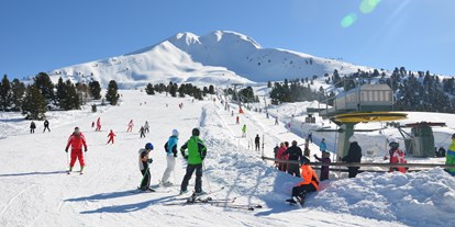 Skiregion - Preisniveau: € - Trentino-Südtirol - Einfache Übungshänge für die ersten Skischwünge - Skigebiet Jochgrimm