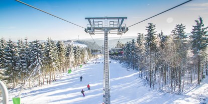 Skiregion - Après Ski im Skigebiet: Skihütten mit Après Ski - Winterberg - Skiliftkarussell Winterberg