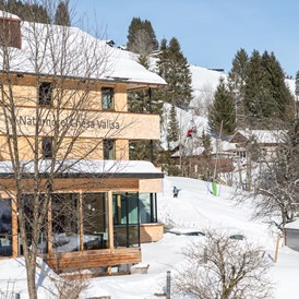 Unterkunft: Fassade Stammhaus - Winter - Naturhotel Chesa Valisa
