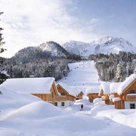 Unterkunft: Hüttendorf im Winter - AlpenParks Aktiv & Natur Resort Hagan Lodge Altaussee