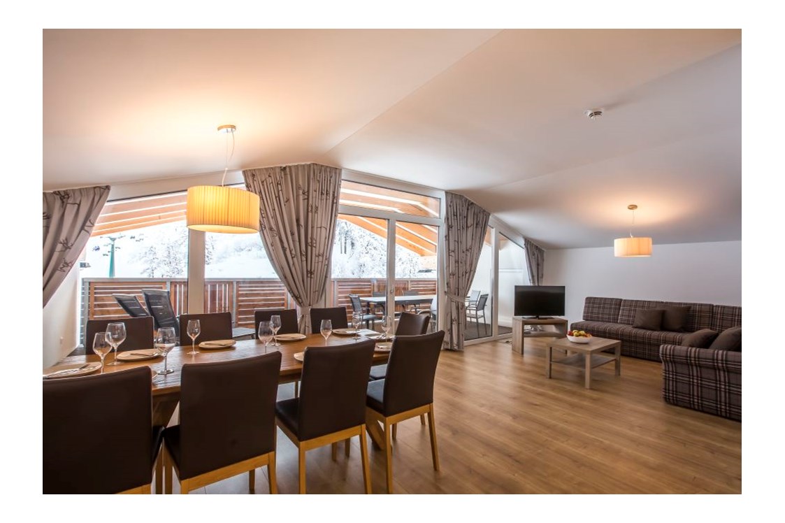 Unterkunft: Appartement im Dachgeschoss - COOEE alpin Hotel Kitzbüheler Alpen