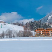 Skiurlaub: Hotel Almrausch - an der Sonnwiesenabfahrt - Hotel Almrausch